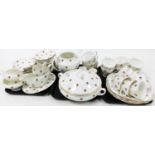 A Harleigh bone china part tea service, depicting roses, to include, cups, saucers, gravy boat,