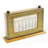 A 1930's oak and silver plated desk calendar, of rectangular form, with articulated paper