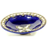 A highly decorative blue glaze pottery bowl, raised with mother of pearl finish and other metal