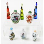 A small group of Oriental and other perfume bottles, of varying design, with animals, figures, and