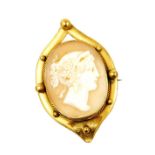 A Victorian cameo brooch, the central cameo depicting a maiden with flowing hair and flowers, in a