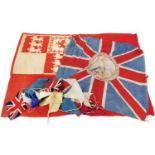 A Queen Victoria diamond jubilee cloth Union Jack backed flag, 68cm wide, various other vintage
