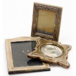 Various silver photograph frames, to include Edwardian silver example of inverted form, on oak back,