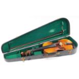 A 20thC two piece violin, with Geronimo Grandini Snr Paris label, 60cm wide, the main body 35cm,