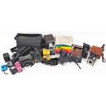 Various camera related equipment, to include Kodak, a Polaroid camera partially boxed, 15cm wide,