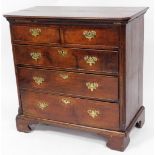A George III mahogany chest, of two short and three long drawers, each with brass handles, with fret