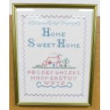 A modern cross stitch, Home Sweet Home, with letters and numbers, in modern frame, 40cm x 31cm.N.