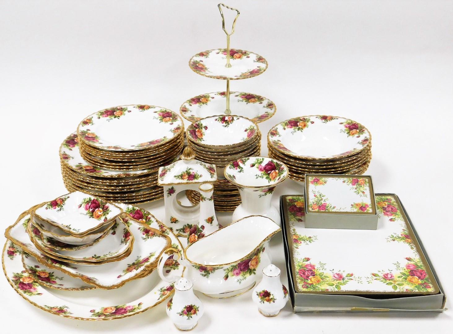 A Royal Albert Old Country Roses pattern part dinner service, comprising twelve cake plates, cake