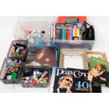 Various toys and games, comprising DVDs. Mobil and other type figures, elaborate frame, watercolour,