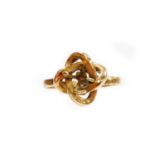 A gold coloured silver dress ring, with central cluster design. N.B. This lot is sold on behalf of