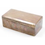 A George V Art Deco silver cigarette box, rectangular shaped, cedar lined with sectional interior,