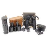 A pair of Heath and Co military issue field binoculars, in brown leather case, black with leather