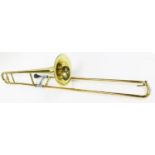 A Blessing Scholastic Elkhart Ind USA trombone, with mouthpiece, 114cm long, the horn 20cm wide.N.B.