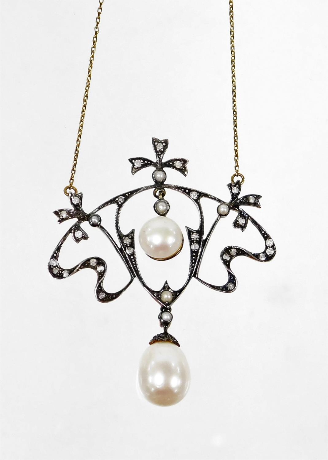 An ornate diamond and pearl necklace, in Belle Epoque style with bows and sprays, set with tiny - Image 2 of 3