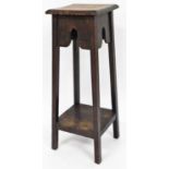 A late 19thC mahogany plant stand, with square design top, two fold sides, on square tapering