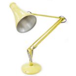 A Herbert Terry and Sons vintage angle poise lamp, with cone shaped shade, 23cm wide, on circular