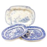 Three blue and white meat plates, comprising two similar in Booths style and an E M and Co larger