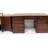 A 20thC mahogany twin pedestal desk, tooled leather top, raised above three frieze drawers and six