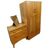A late 20thC vintage E Gomme G-Plan two piece bedroom suite, comprising chest of three drawers