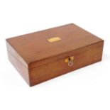 A 19thC mahogany writing box, rectangular shaped with plain cartouche and elaborate escutcheon, with