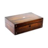 A Victorian rosewood and mother of pearl writing box, of rectangular form with a plain cartouche,
