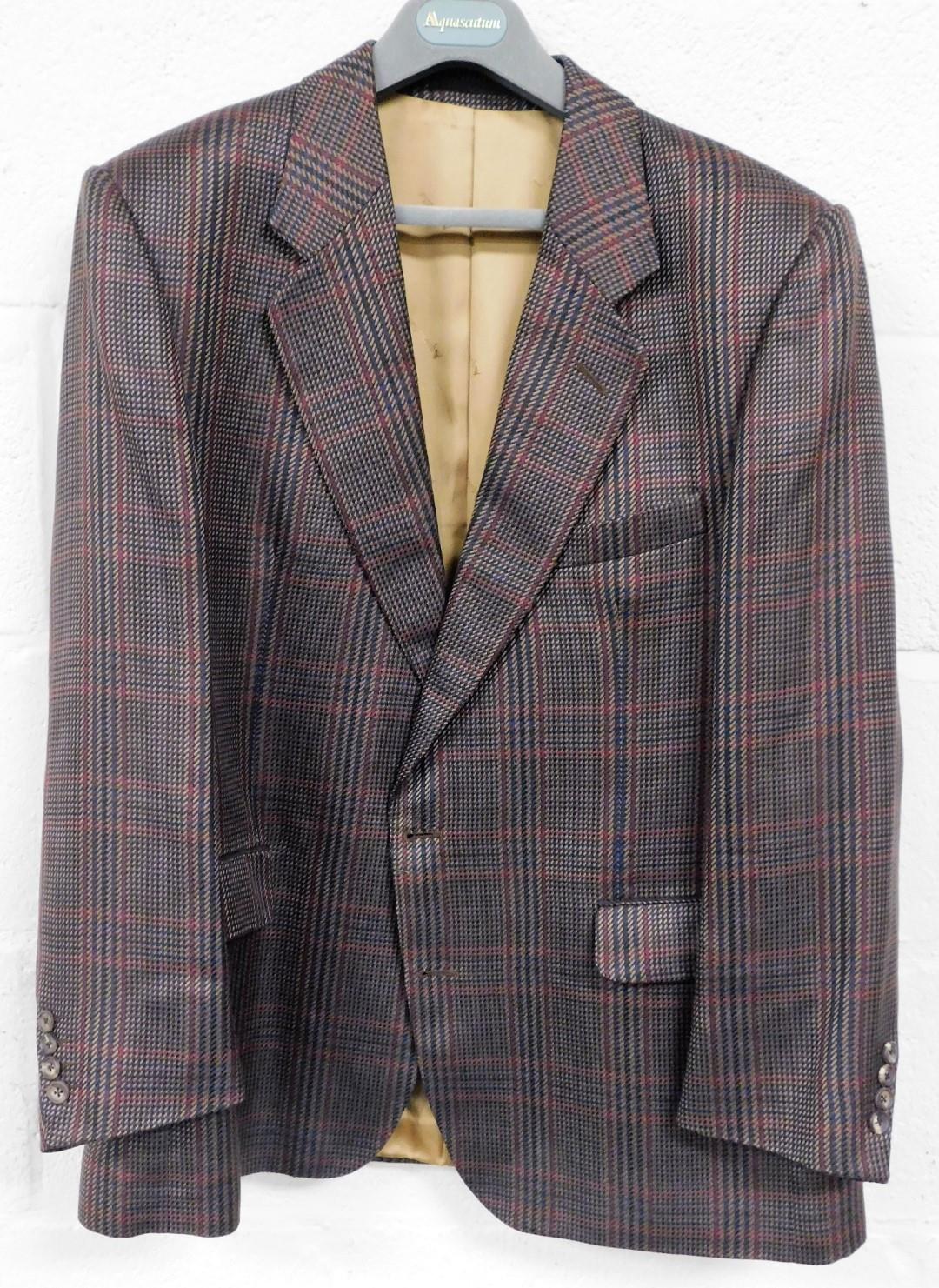 An Aquascutum gentleman's checked silk sports jacket, the brown red and blue check design, with a