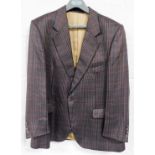 An Aquascutum gentleman's checked silk sports jacket, the brown red and blue check design, with a