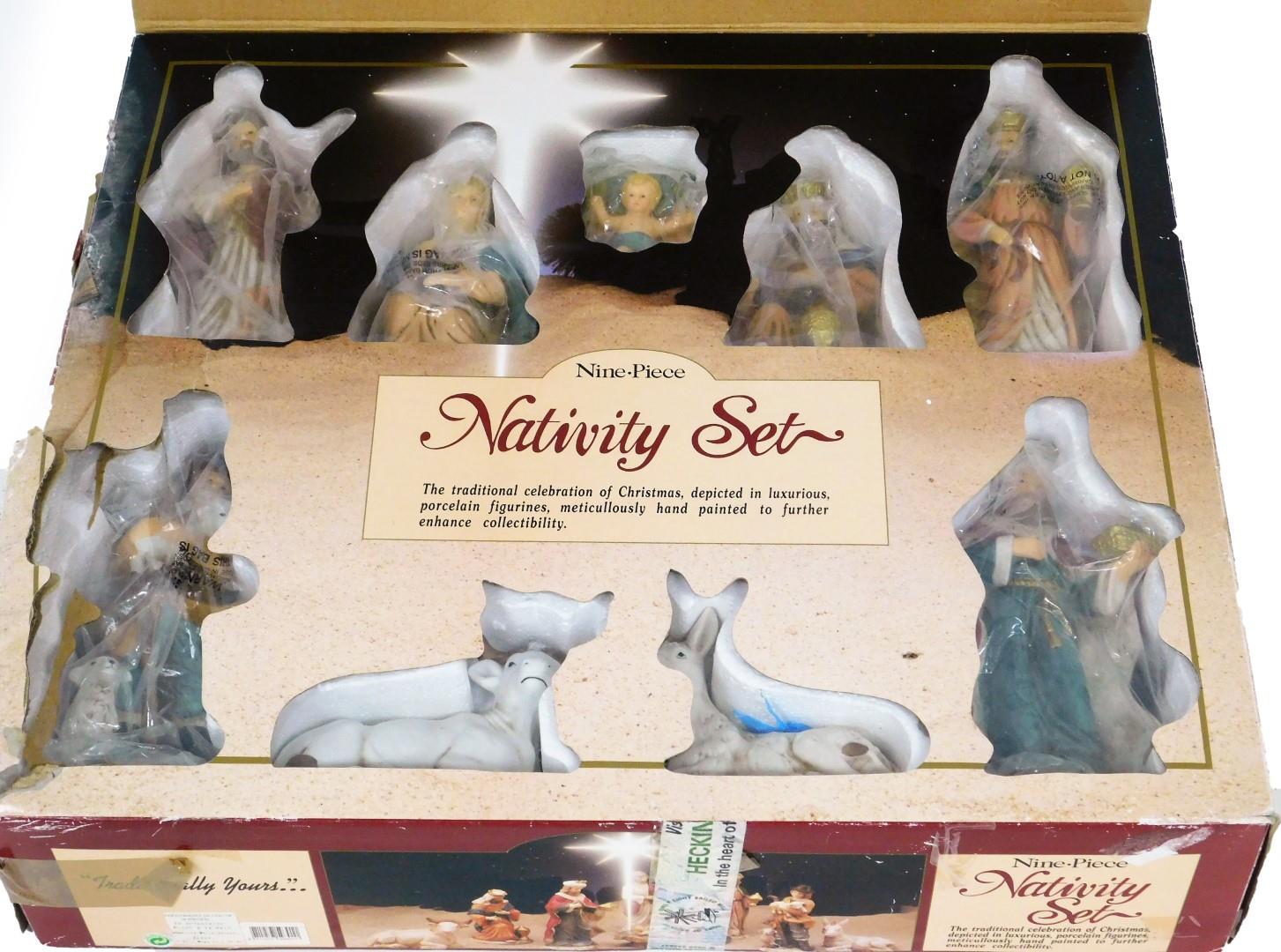 A Deluxe collectors edition nine piece nativity set, boxed.