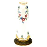 An early 20thC Moorcroft bud vase, converted to a lamp type base on a ormolu foot, with drilled