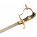 A sword with curved blade, turned grip, ear shaped guard and compressed pommel, 95cm wide.