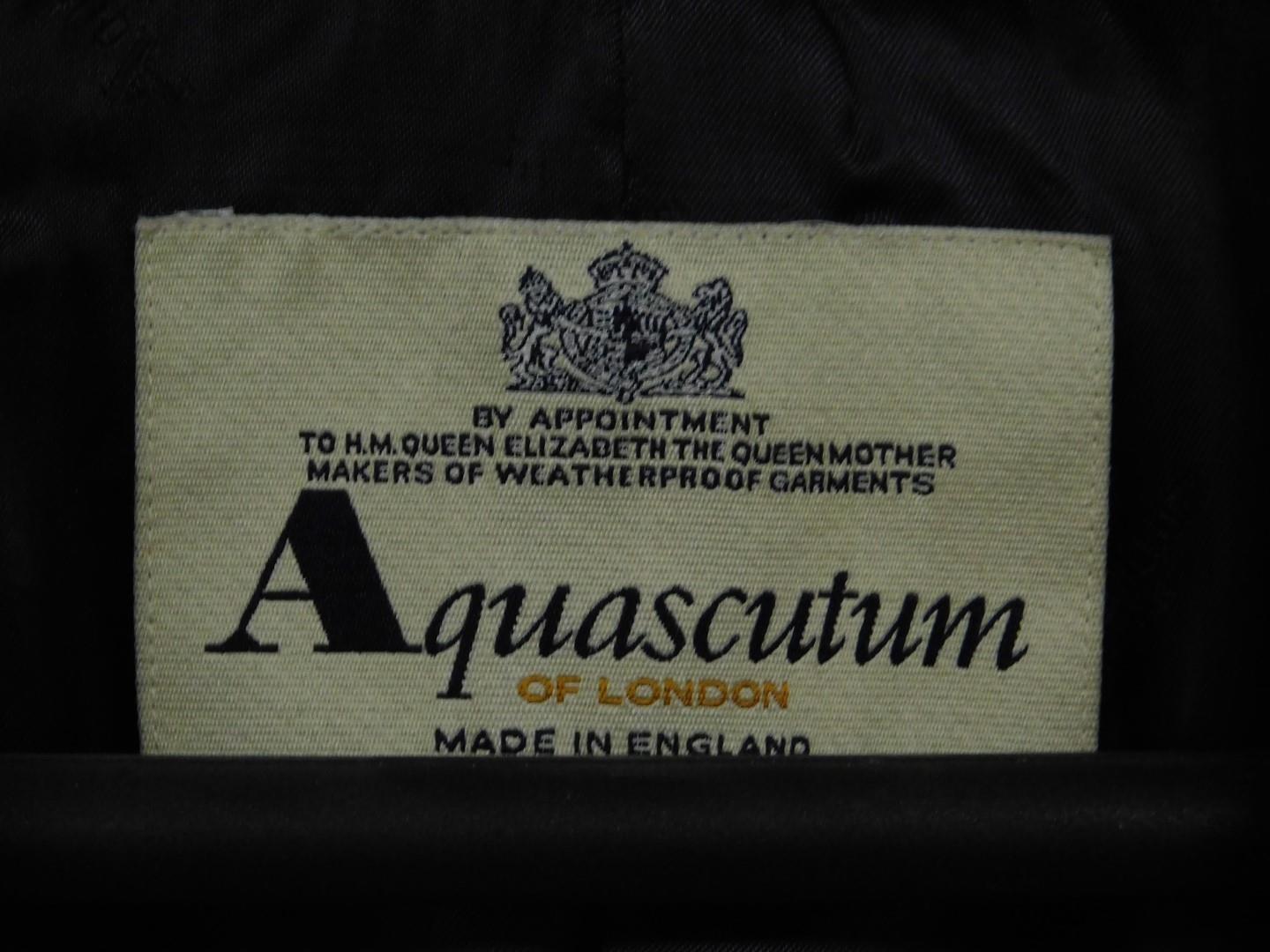 An Aquascutum of London gentleman's overcoat, the navy lambs wool woollen coat with blue velvet - Image 2 of 2