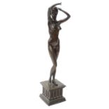 Tom Merrifield (b.1932). A figure of a nude female dancer, on a square plinth decorated with