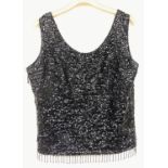 A vintage ladies sequin style evening top, in black with a geometric design, De Luxe label