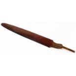 A wooden page turner, of shaped form with leaf handle, 100cm wide.