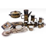 A Denby Studio style part service, in floral pattern on dark brown ground, to include coffee pot,