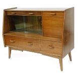 A mahogany G-Plan style sideboard, with one long and one short drawer to the top, with a cupboard,