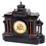 A Victorian slate and marble mantel clock, in an architectural case, surmounted by a compressed dome