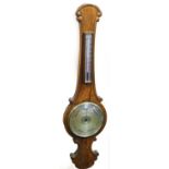 A 19thC oak cased wheel barometer, stamped from The Royal Exchange destroyed by fire on the 9/16th