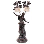 A 20thC spelter table lamp, formed as a lady in flowing robes on a naturalistic base and inverted