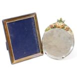 A sterling silver mirror, with material mount and plain easel back, 24cm x 18.5cm, with 19.5cm x