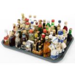 Various miniature alcohol bottles, to include Grand Marnier, 11cm high, Haig whisky, etc. (a