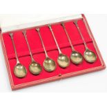 A cased set of six George V silver teaspoons, with inverted tops, plain stems, and plain bowls, 11cm