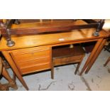 A teak school desk, with three single drawers on plain top, 74cm high, 90cm wide, 46cm deep.