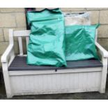 A garden storage bench, folding camping chairs, etc.