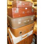 A quantity of vintage leather and other suitcases, to include names such as Python, Antler,