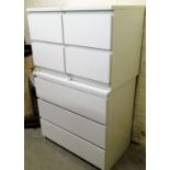 A modern white finish part bedroom suite, comprising two two drawer bedside chests, 55cm high,