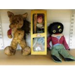 A Pelham Puppet Mitzi, partially boxed, fox plush jointed doll, and a golly doll. (3)