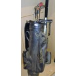 A Howson golf bag, with vintage golf clubs, wooden headed drivers, caddy car, etc., the golf bag