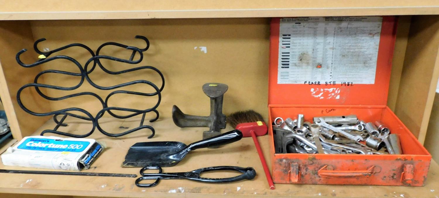 A wrought iron wine rack, various spanner and socket sets, other metal ware, tongs, etc. (1 shelf)