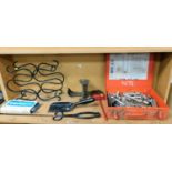 A wrought iron wine rack, various spanner and socket sets, other metal ware, tongs, etc. (1 shelf)